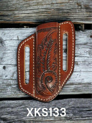 Twisted X Feather Carved Knife Sheath.