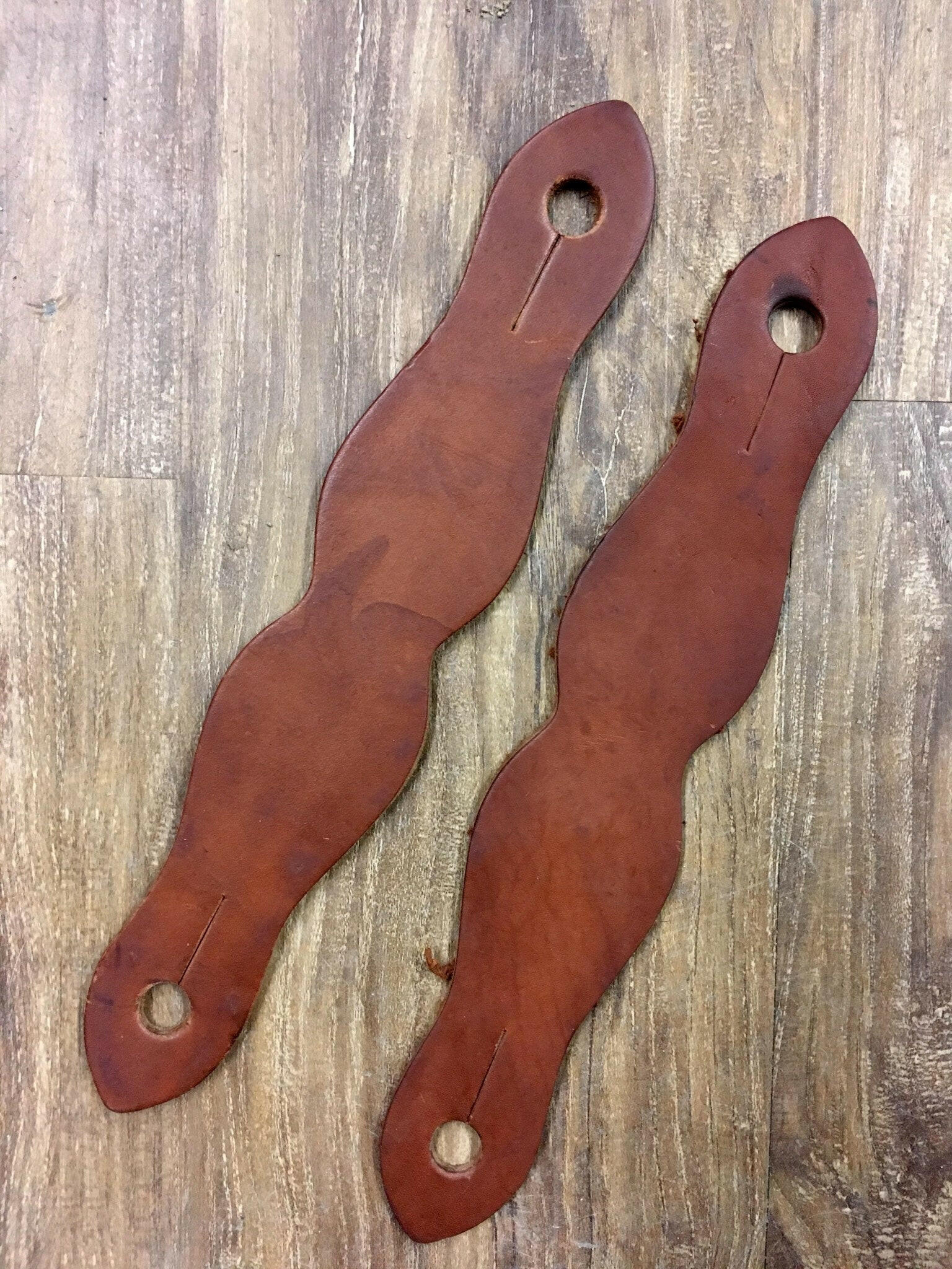 Leather Slobber Straps.