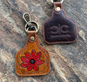 COUNTRYSIDE COWTAG RED FLOWER KEYCHAIN.