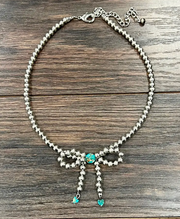 WESTERN SILV BOW NECKLACE 739624.