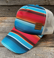 Rodeo Drive Serape Ponytail Trucker Hat.