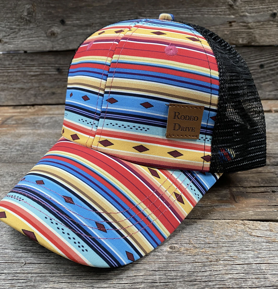 Rodeo Drive Aztec Ponytail Trucker Cap.